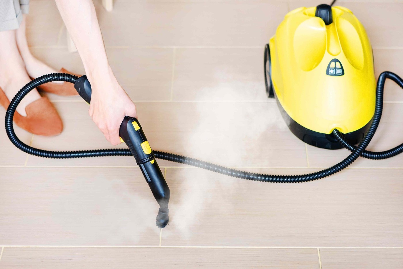 Use the Correct Brush and Remove Water When Steam-Cleaning Grout