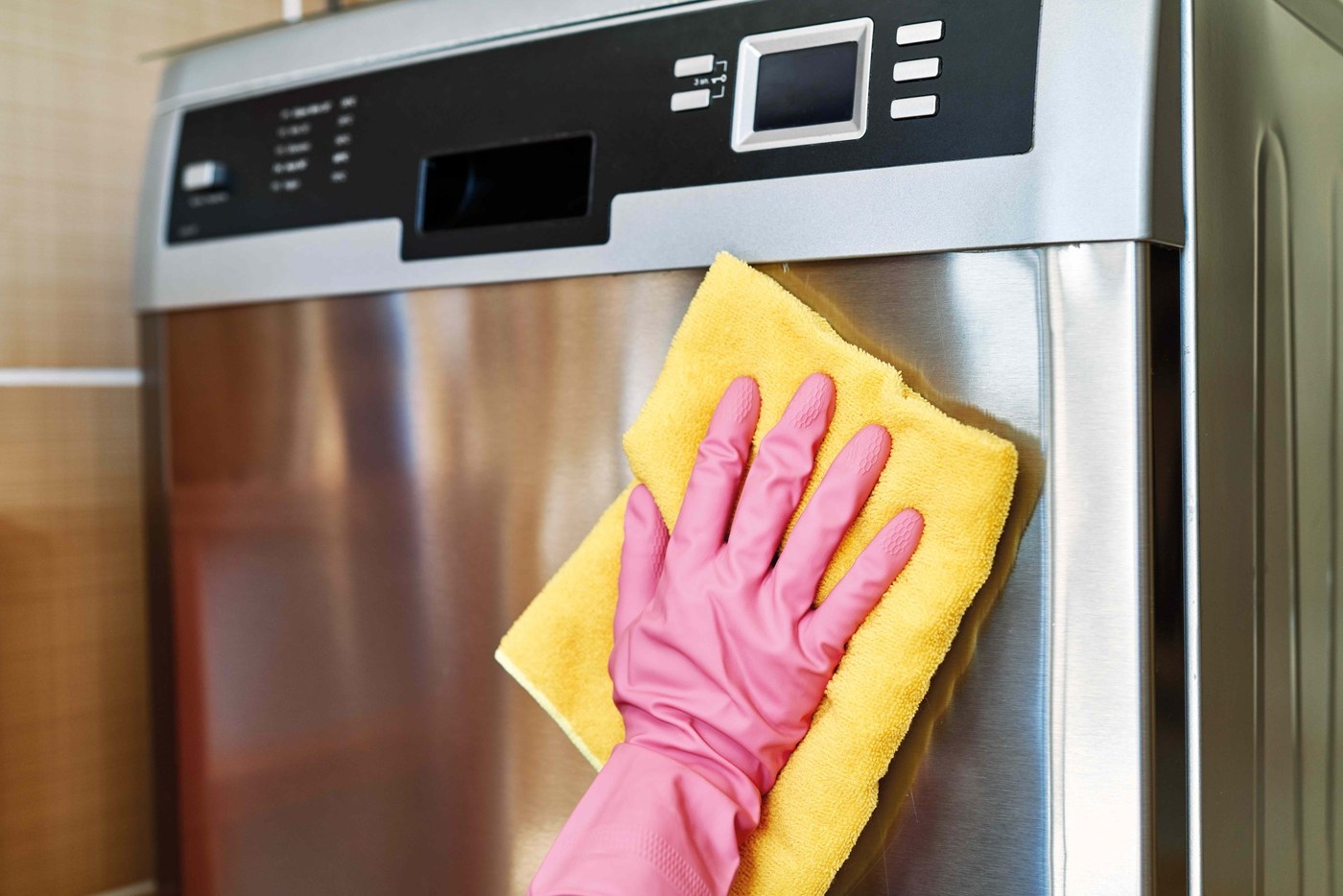 Use a Soft Cloth and Grain-Direction Wipes on Steel Appliances