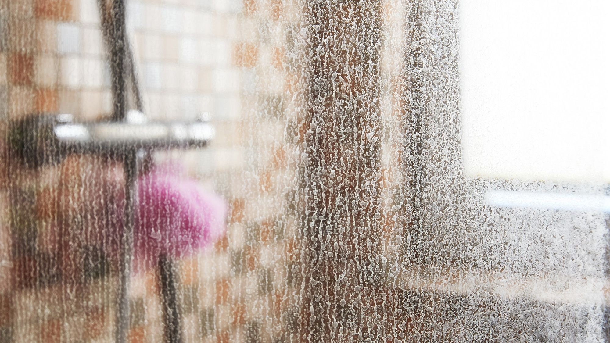 Give a Suitable Shower Cleaner Time Before Wiping