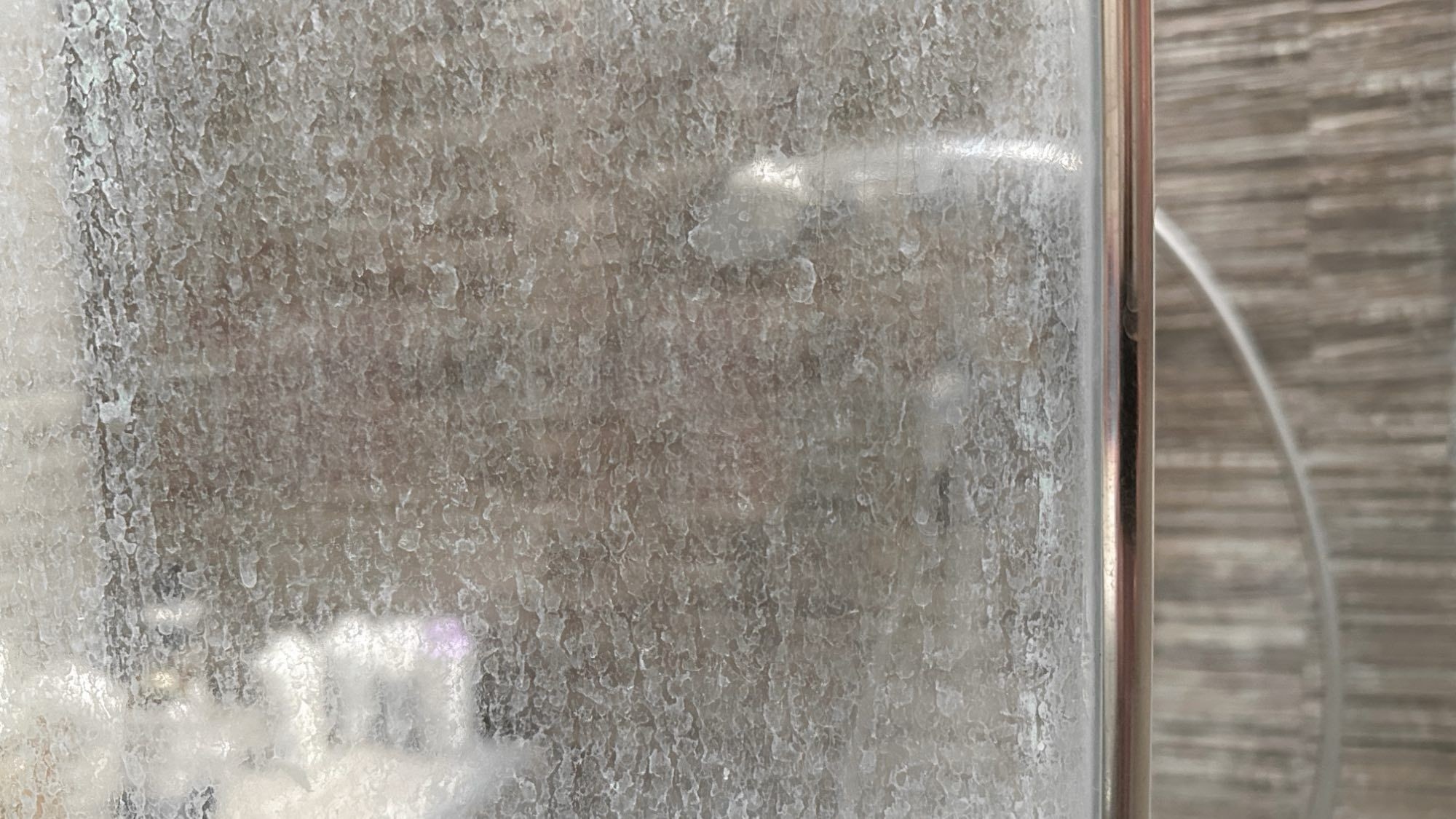 Remove Soap Film Without Forgetting the Door's Coating