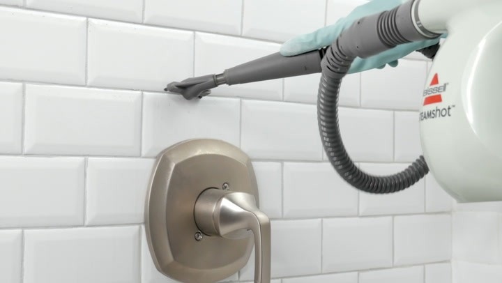 Use the Correct Brush and Remove Water When Steam-Cleaning Grout